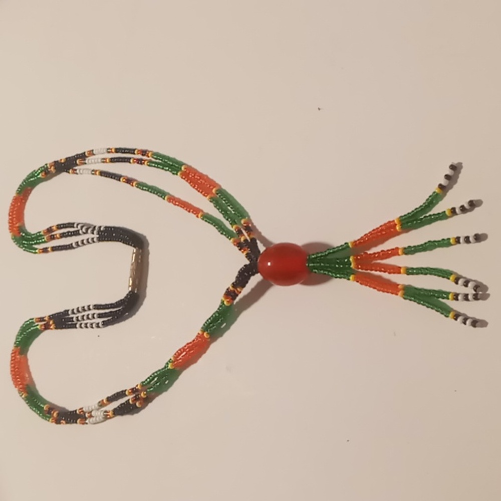 Vintage Seed bead necklace 16 inches long. Africa heritage colors
